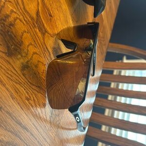 Black and light gold oakleys prism, little rattle from falling but it’s not bad